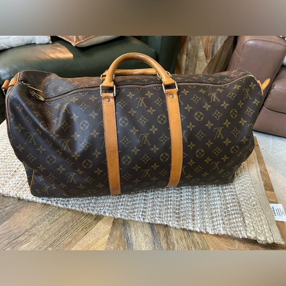 (sold) authentic Louis Vuitton keepall Bandouliere 55 with luggage tag & strap!